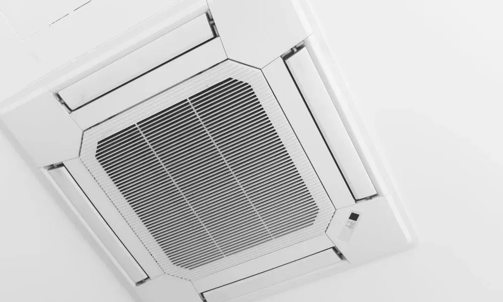 A ceiling-cassette ductless mini-split indoor unit
